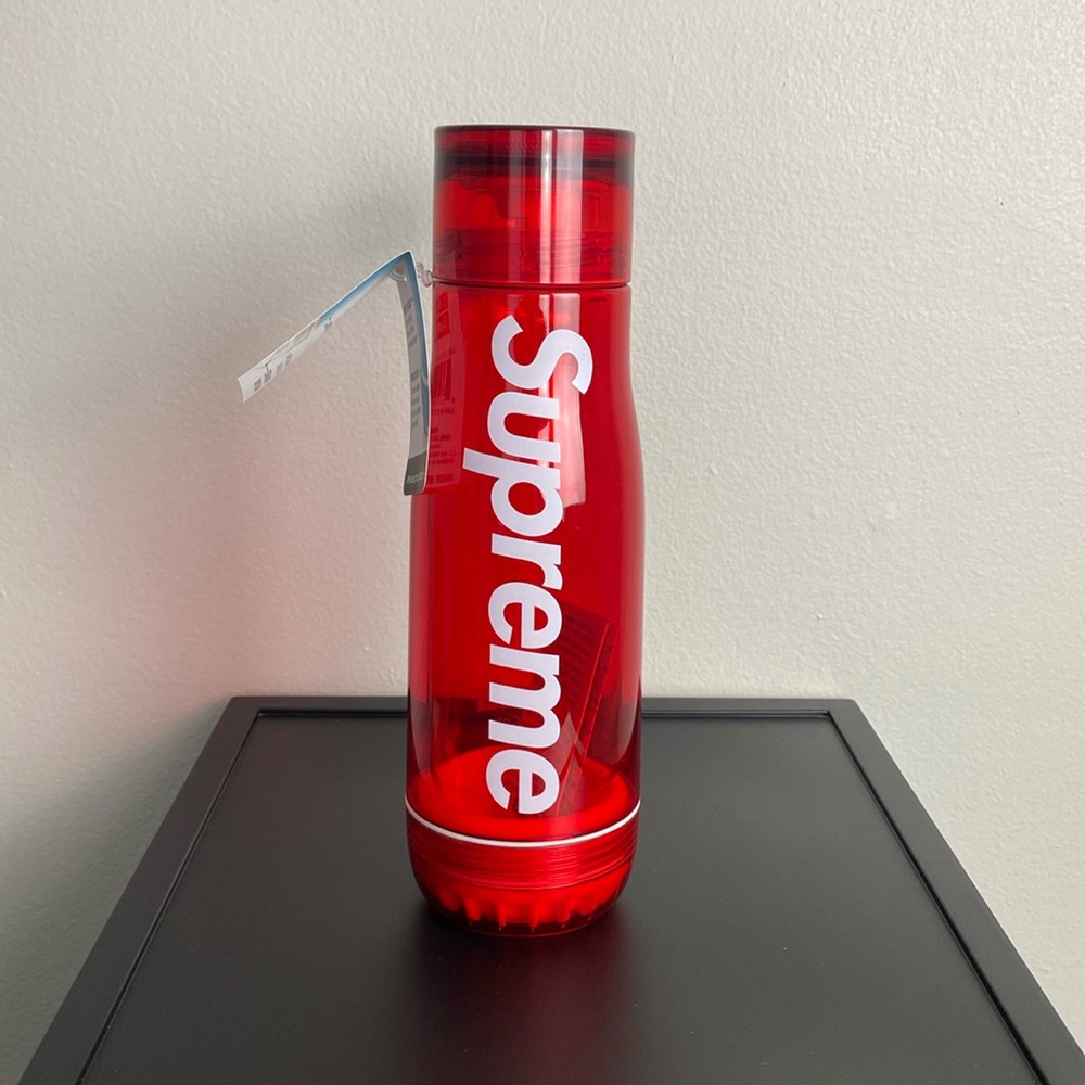 Supreme ss21 glass core water bottle. Red